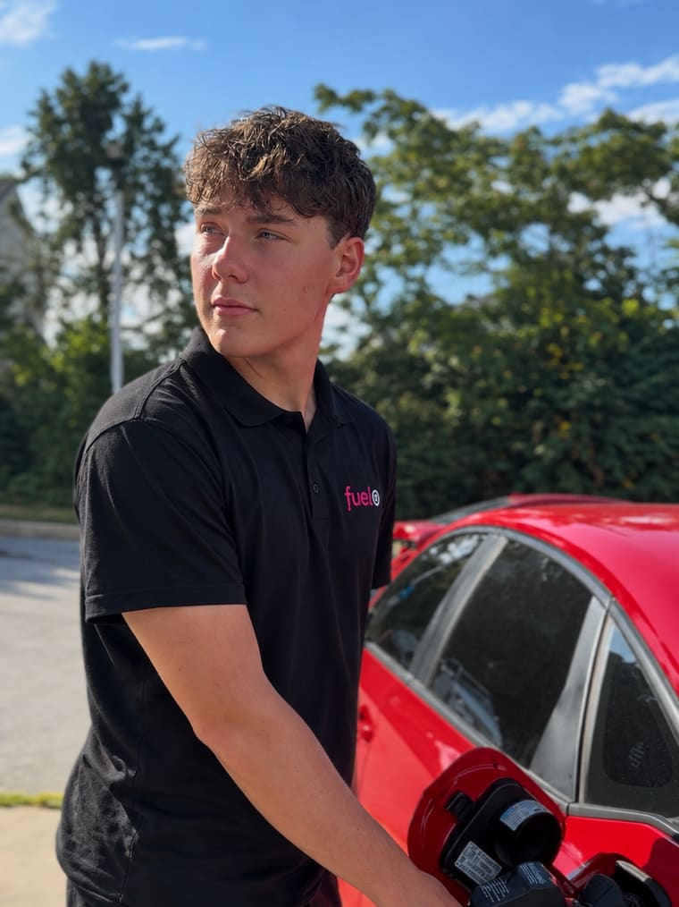 Matt, a Fuelo co-founder, fueling a car